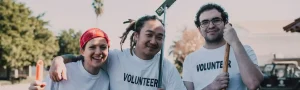 A group of cleanup volunteers with matching t shirts.